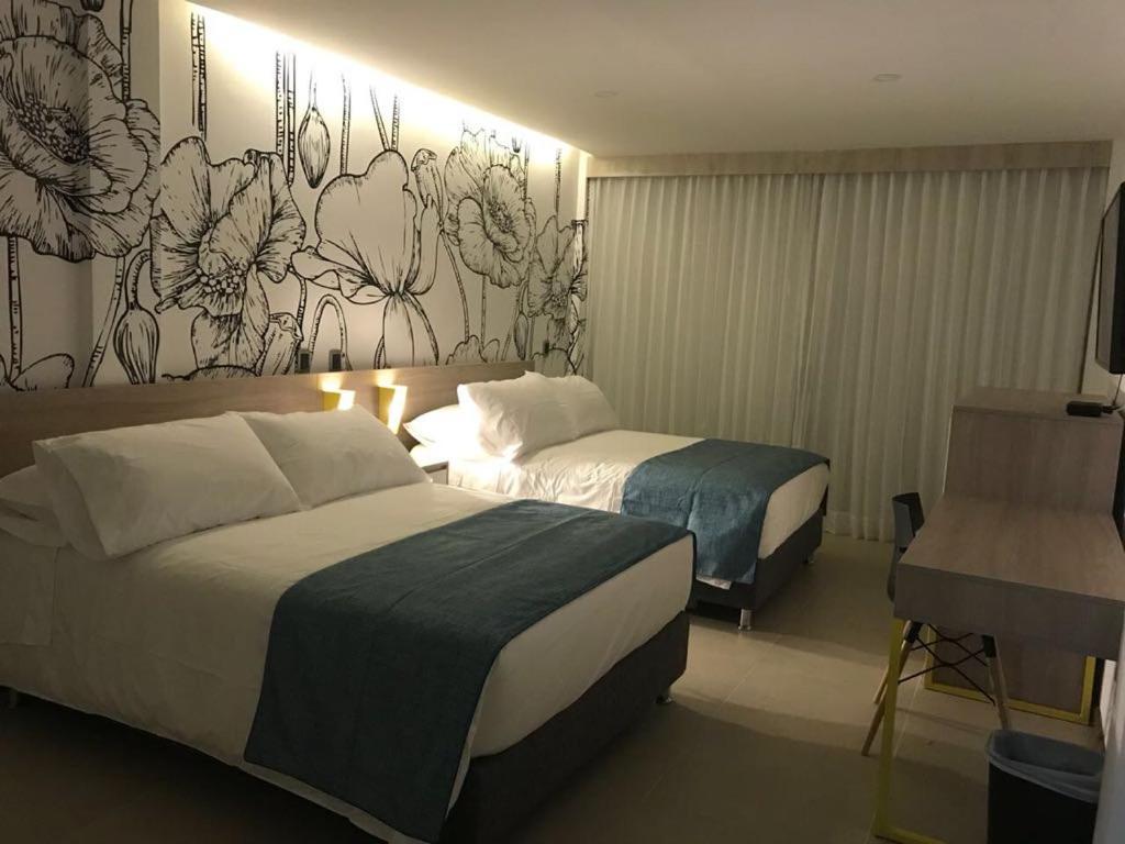 Hotel Karmel Melgar Bagian luar foto